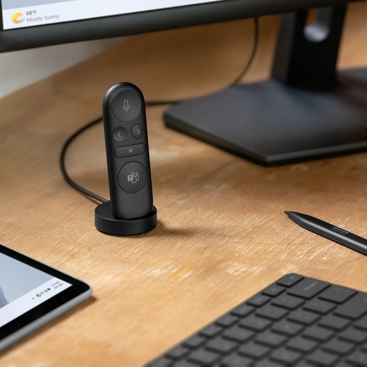 The Microsoft Presenter+ on a desk setup.