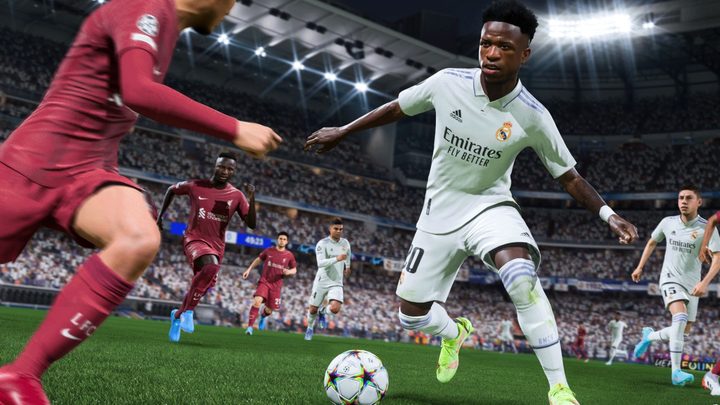 Real Madrid's Vinícius Júnior taking on a defender in FIFA 23.
