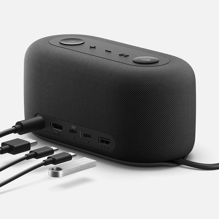 A Microsoft Audio Dock with four peripherals plugged in.