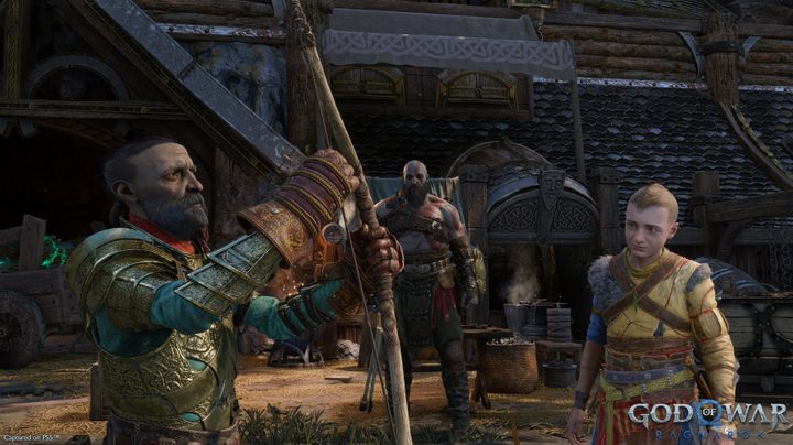 Sindri examining a bow.