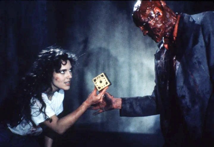 Kristy gives the puzzle box to a man in Hellraiser.