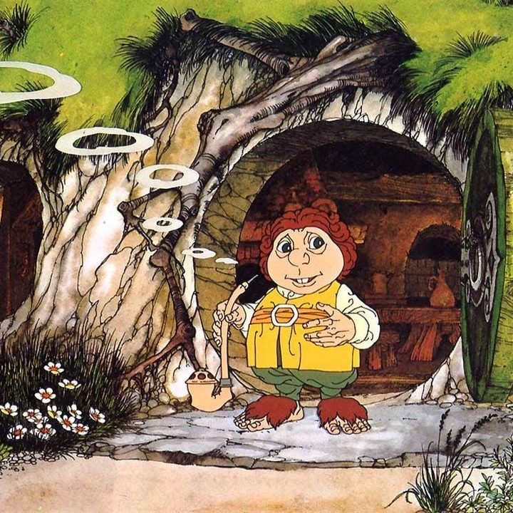 Bilbo Baggins stands outside his house in a scene from The Hobbit.