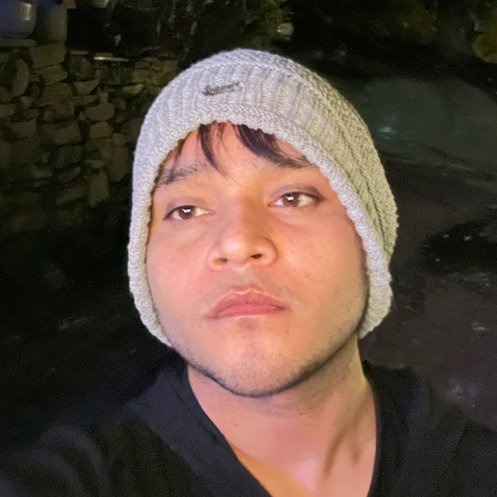 Low light selfie captured by iPhone 14 Pro.