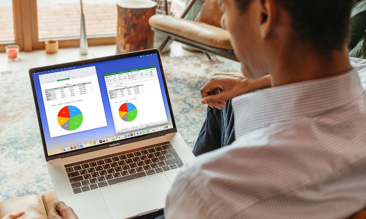 Numbers and Excel on a MacBook with a business person.