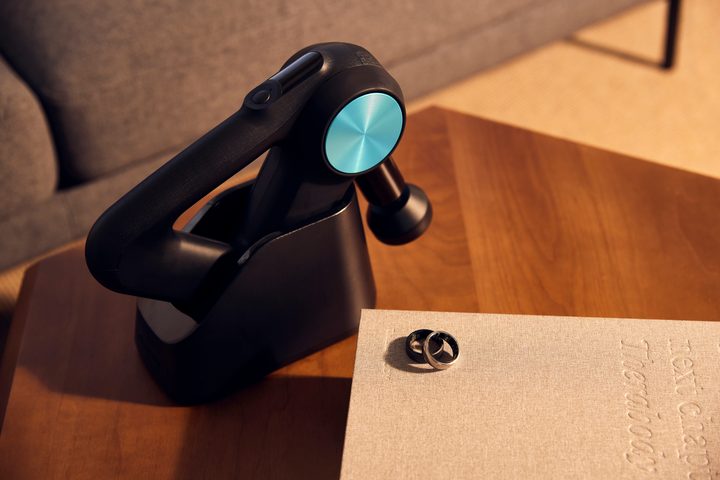 Oura Ring and Therabody's Theragun massage device.