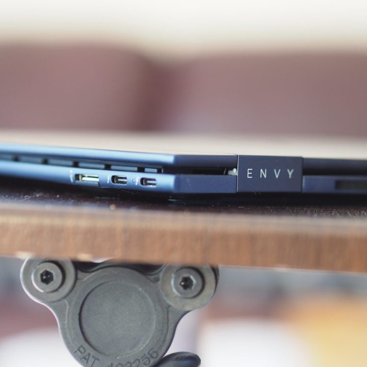 HP Envy x360 13 2022 side view showing logo and ports.