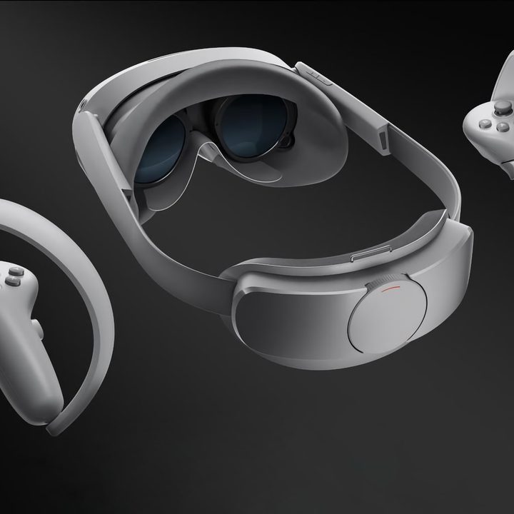 Pico 4 Enterprise VR headset and controllers are shown from behind on a black background.