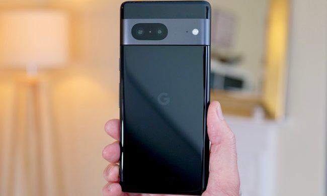 The back of the Google Pixel 7, held in a man's hand.