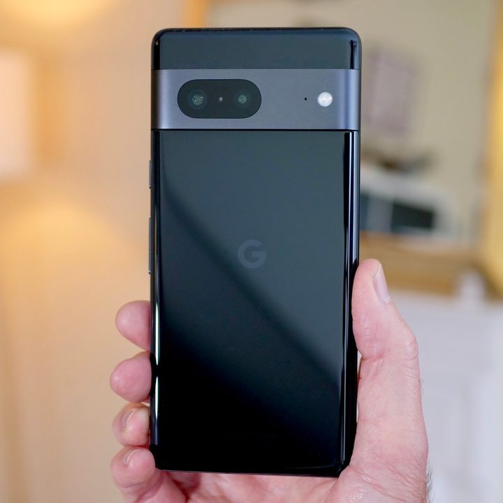 The back of the Google Pixel 7, held in a man's hand.