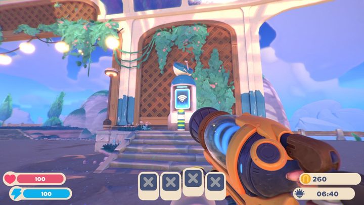 A player looking at the message kiosk in Slime Rancher 2.