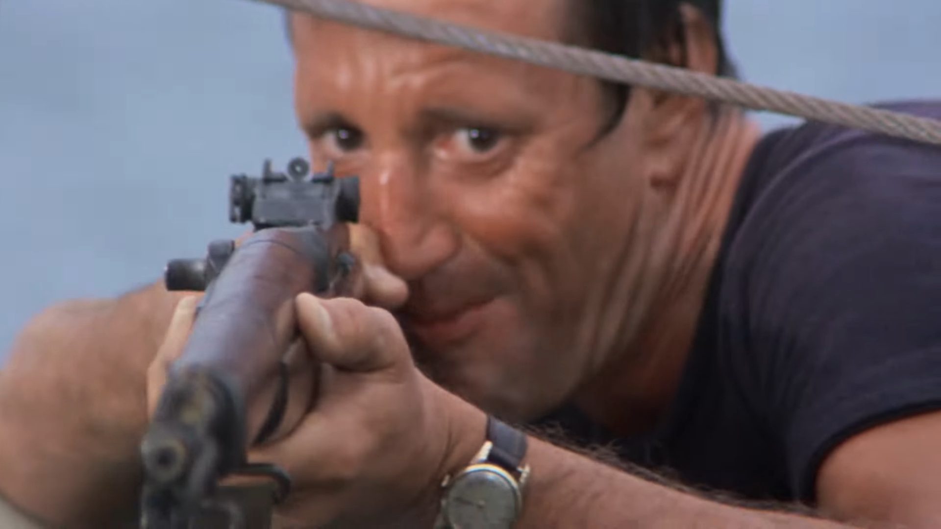 Brody aims his gun on Jaws.