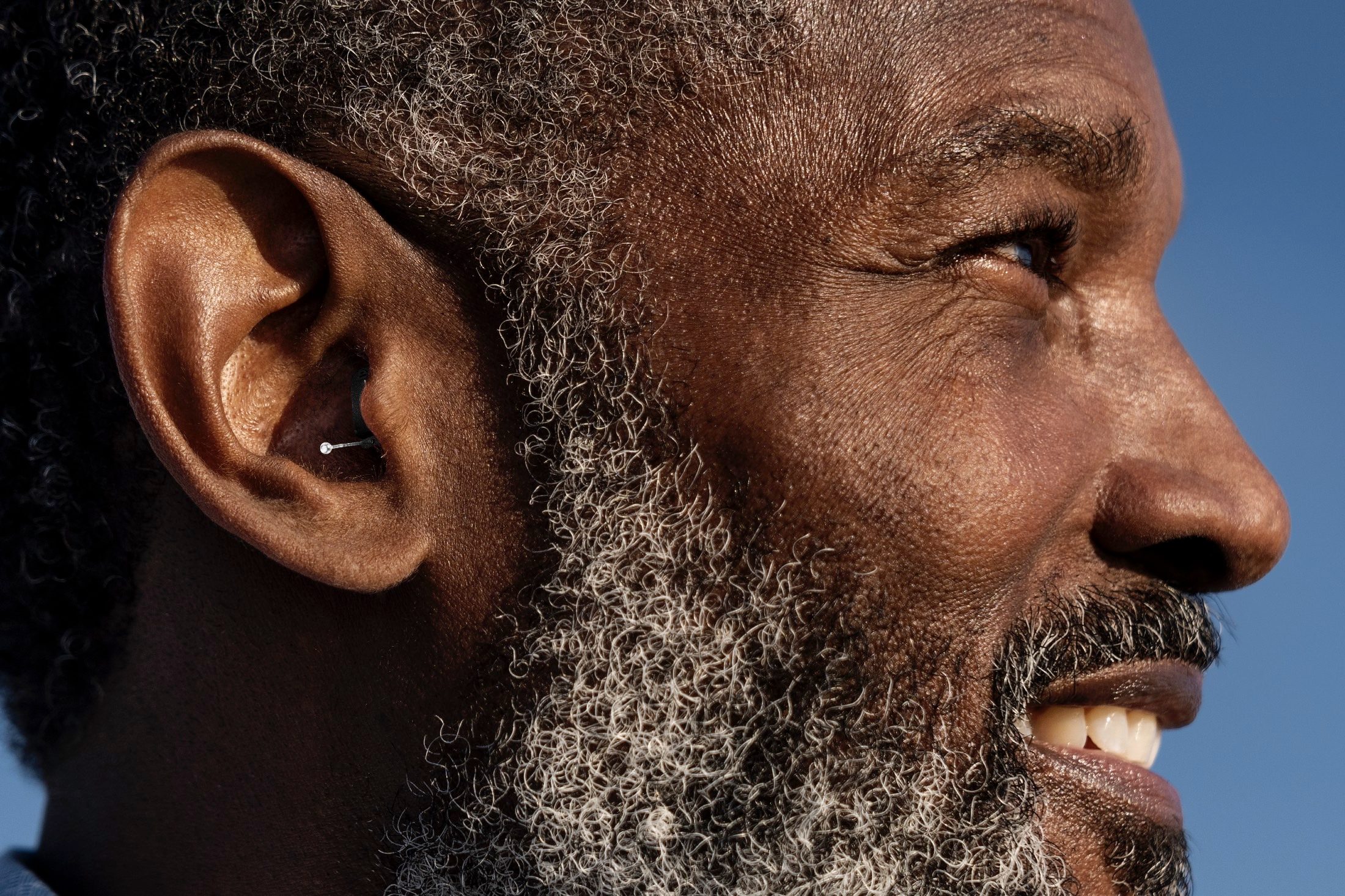 Man wearing Sony CRE-C10 OTC hearing aids.