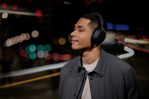 Man listening to Sony headphones in the street.
