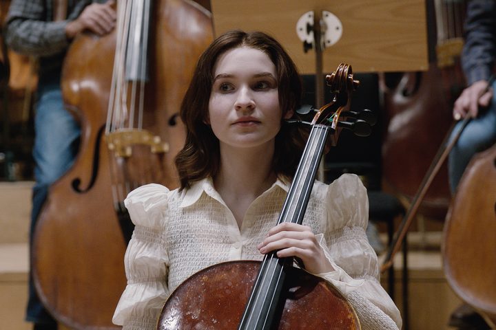 Sophie Kauer holds a cello in Todd Field's TAR.