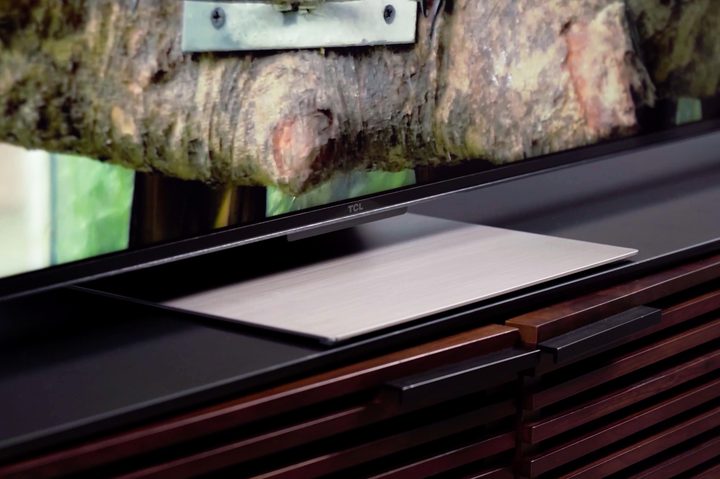 Close-up view of the TCL 6-Series TV central pedestal stand