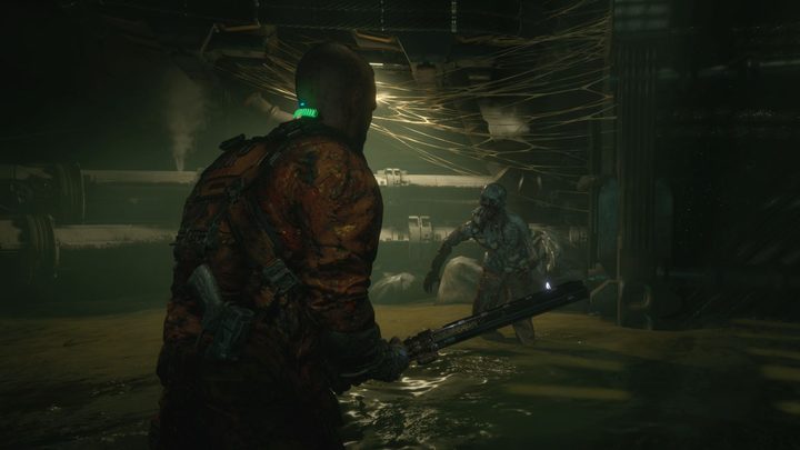 Jacob Lee fights an enemy in a water treatment facility in The Callisto Protocol.