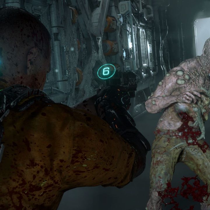 Jacob Lee aims a gun at an enemy in The Callisto Protocol