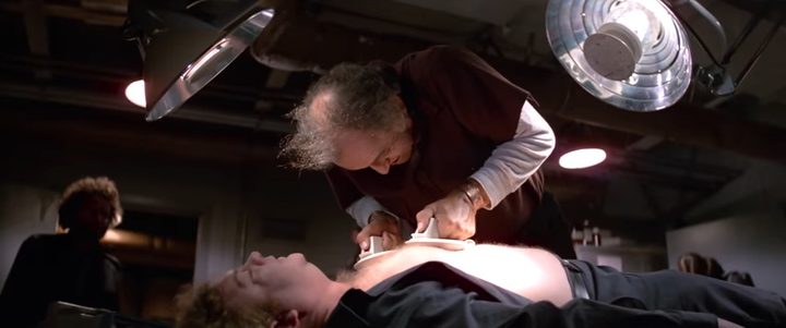 copper-using-a-defibrillator-on-norris-in-the-thing-1982
