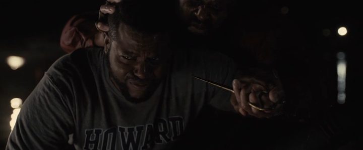 abraham-holding-scissor-near-gabe's-face-us