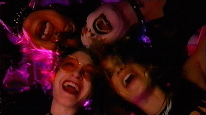 Four girls laugh in V/H/S/99.