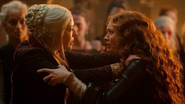 Alicent and Rhaenyra clutch each other in House of the Dragon.