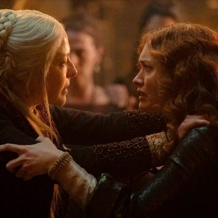 Alicent and Rhaenyra clutch each other in House of the Dragon.