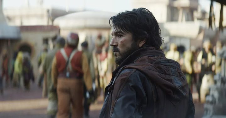 Cassian looks to his left in Andor.