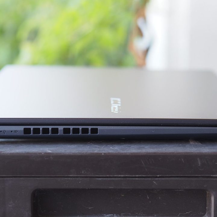 Asus Vivobook 17X left-side view showing ports and vent.