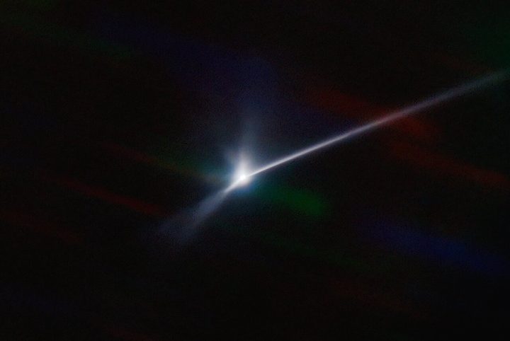 The trail from the Dimorphos asteroid after NASA deliberately crashed a spacecraft into it.