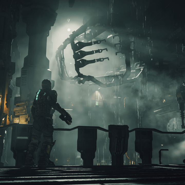 Isaac Clarke stands in a dark room in Dead Space.