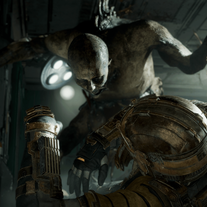 A necromorph attacks Isaac Clarke in Dead Space.