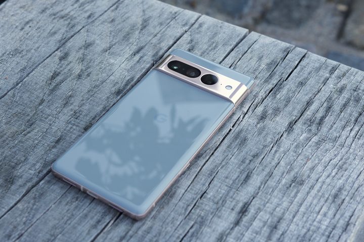 Google Pixel 7 Pro laying face-down on a bench.