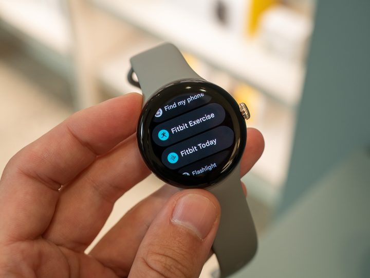 Google Pixel Watch with grey strap.