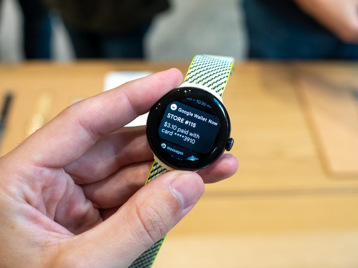 Google Pixel Watch with a Google Pay notification.