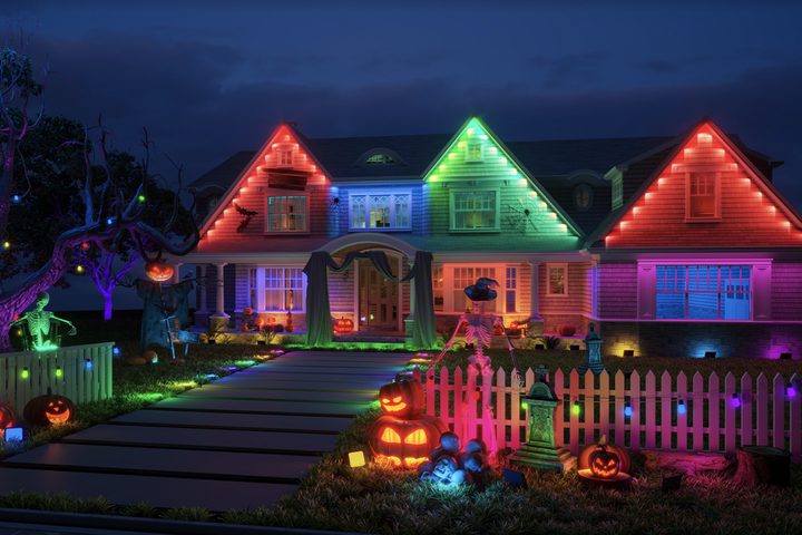 Govee Permanent Outdoor Lights strung up on a house at night for Halloween.