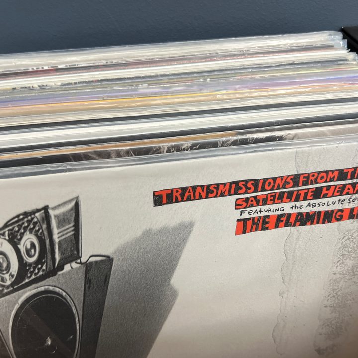Records stored in a top-open record crate.
