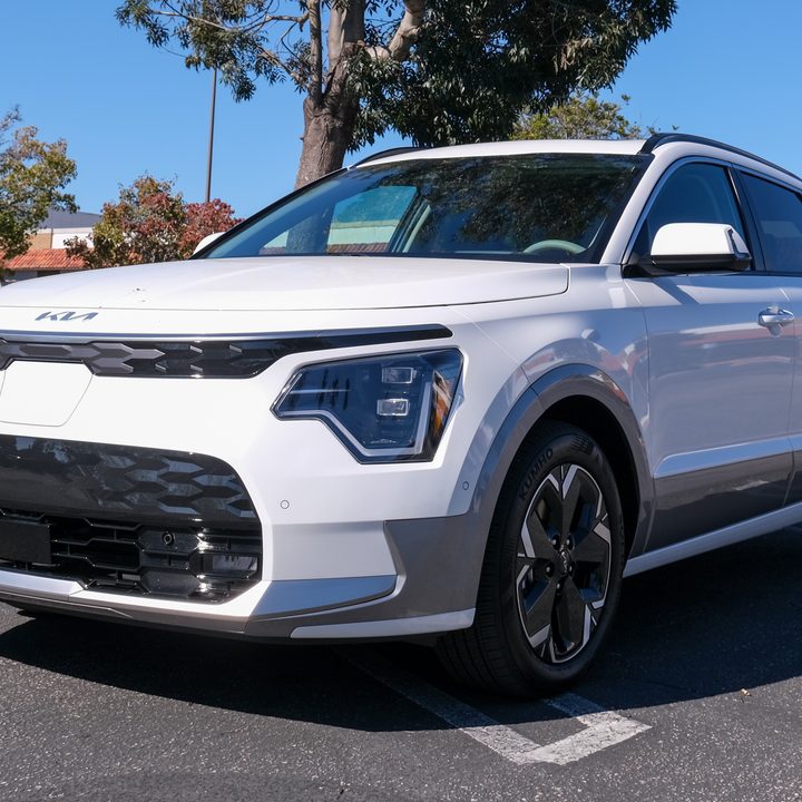 A front three-quarter view of a white Kia Niro EV.