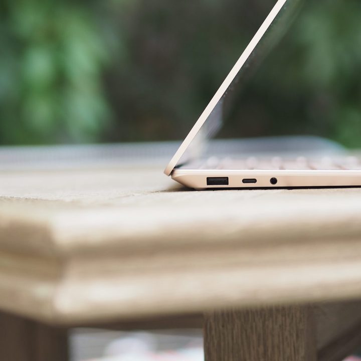 Microsoft Surface Laptop 5 15 side view showing hinge and ports.