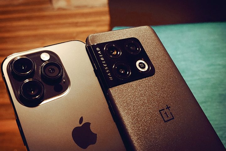 OnePlus 10 Pro sitting atop iPhone 14 Pro