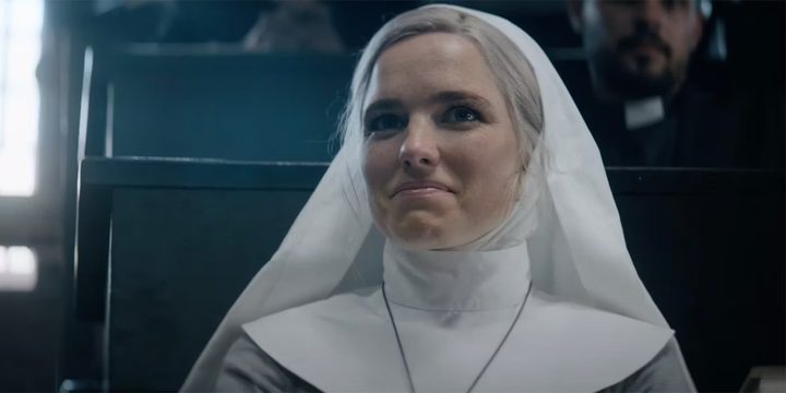 A nun smiles in Prey for the Devil.
