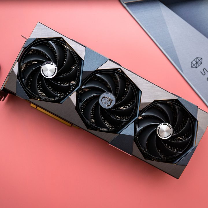 MSI RTX 4090 Suprim X on a pink background.