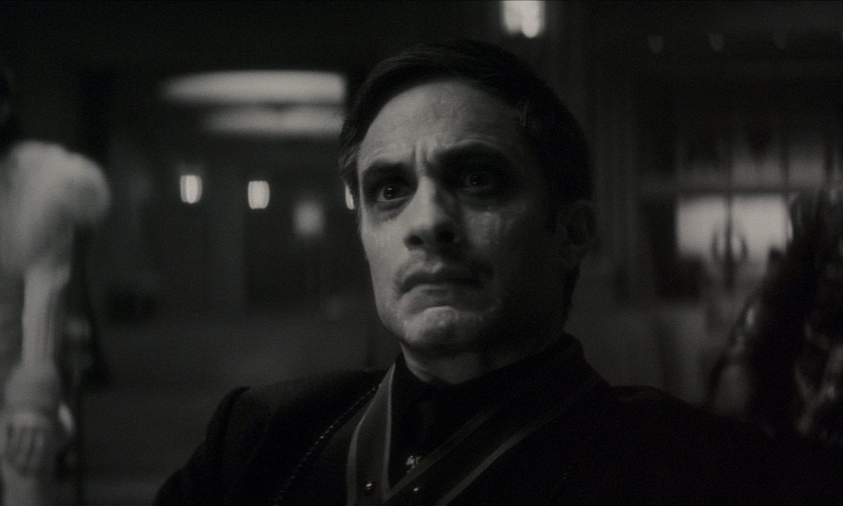 Gael Garcia Bernal stares intently in a black and white scene from Werewolf By Night.