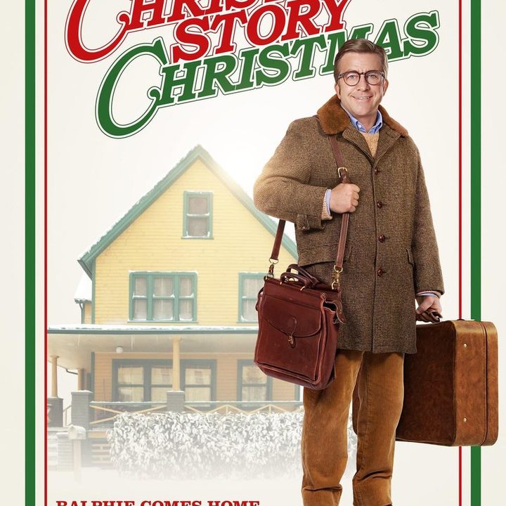 Ralphie stands in front of his house with bags on the poster for A Christmas Story Christmas.