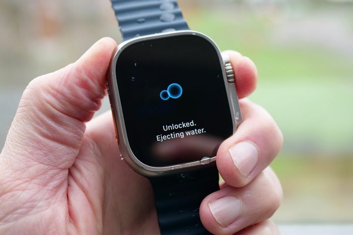 The Apple Watch Ultra ejecting water.
