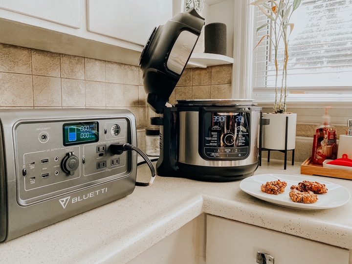 BLUETTI EB70S powering pressure cooker in a tight spot.