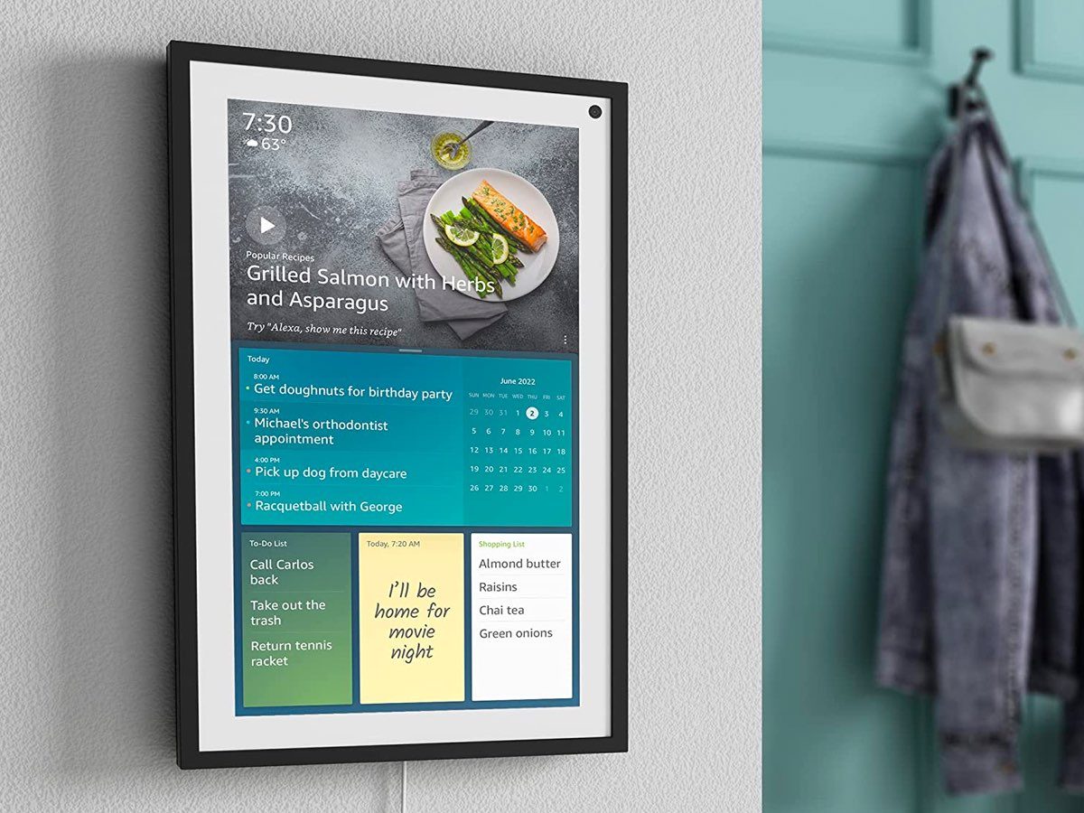 The Amazon Echo Show hangs on a wall.