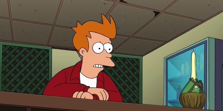 Fry nervously waits for Leela in a restaurant in Futurama