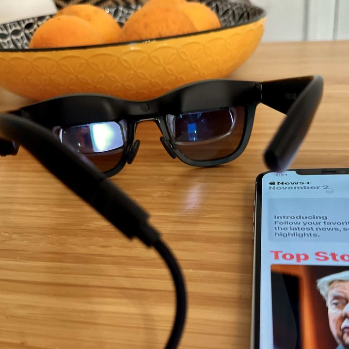 Nreal Air glasses laying on a table.