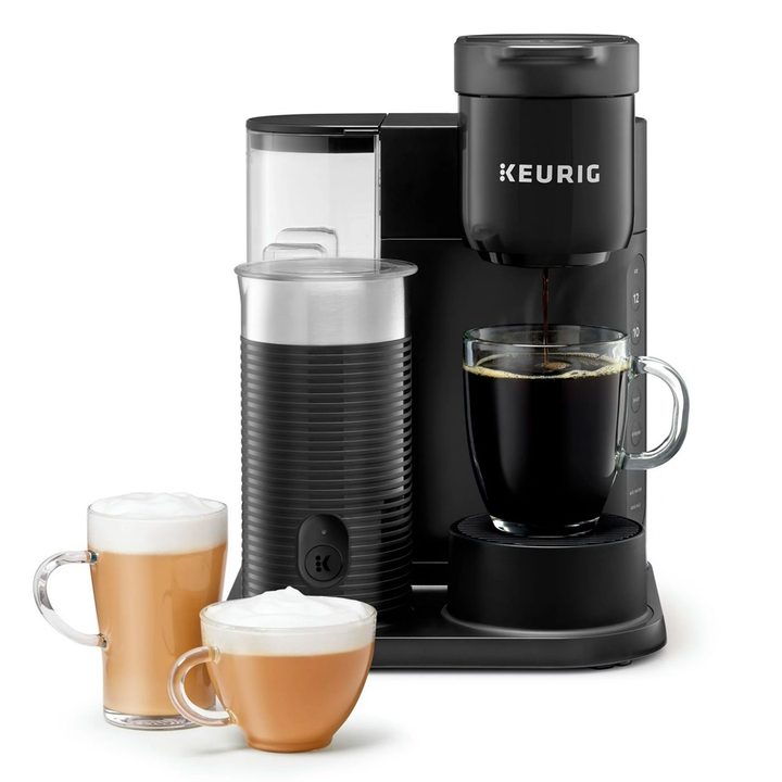 The Keurig K-Cafe Essentials coffee maker brews a cup of coffee.
