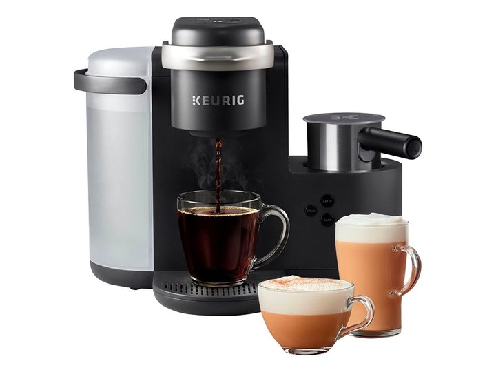 The Keurig K-Cafe single serve coffee maker brews a cup of coffee.